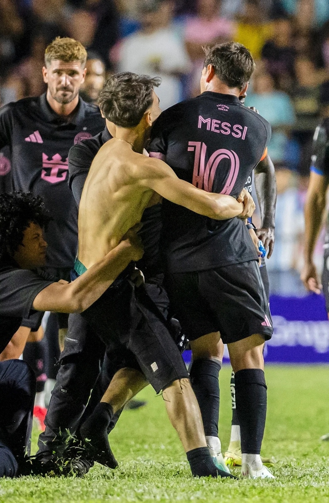 Lionel Messi was knocked to the ground after multiple fans stormed the field during Inter Miamiâs friendly match in Puerto Rico, turning a routine 2â1 victory into chaotic scenes late in the game.