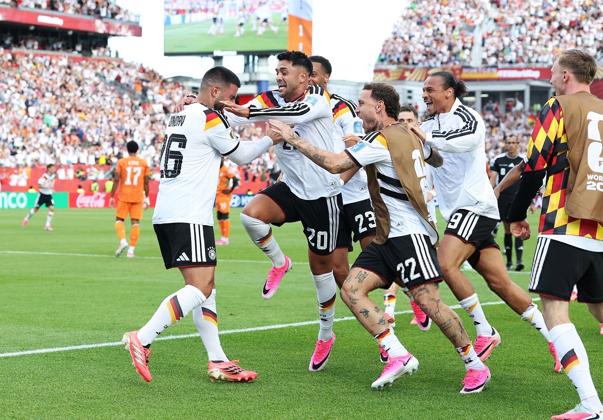 Germany reach knockout stage with comeback win over Elephants
